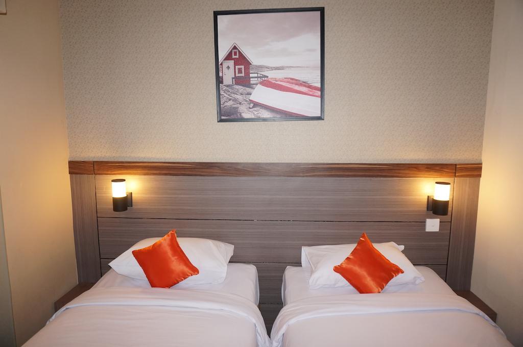 Ekon Hotel ジョグジャカルタ 部屋 写真